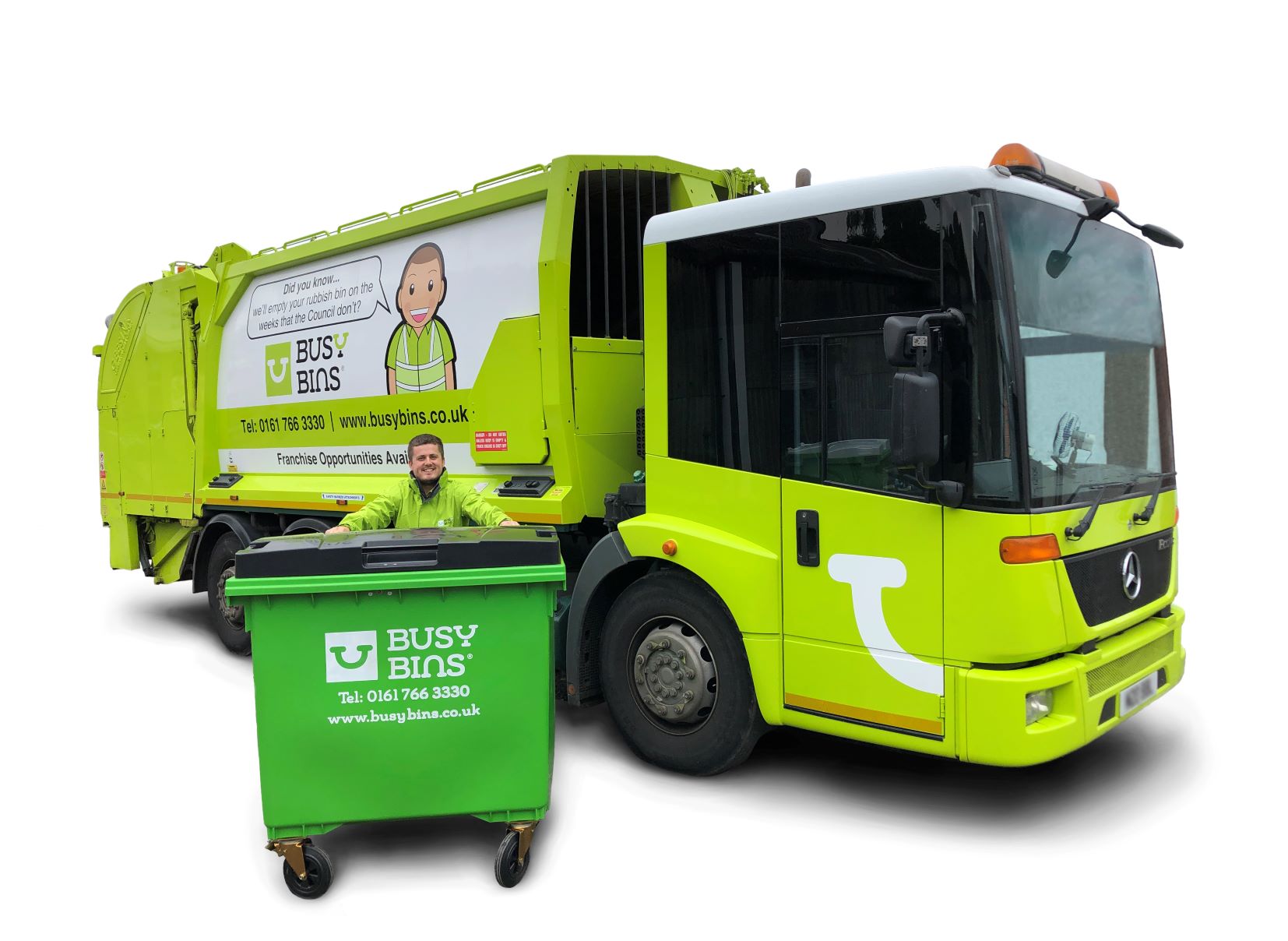 Photograph of the 26 Tonne Busy Bins Bin Wagon that is bright green with signage. Owner Josh Morris is standing in front of the wagon holding onto a large commercial bin that's in front of him.
